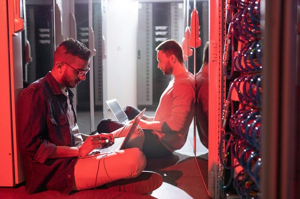 What are the steps to configure an automated patch management system using Ansible?